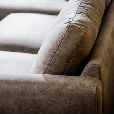 Loungebank in taupe lederlook-stof